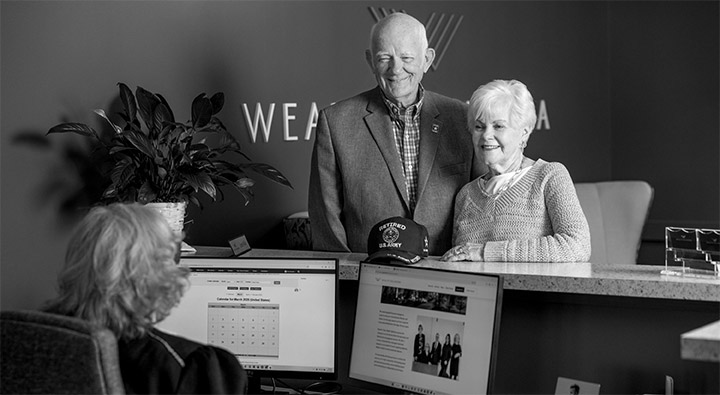 Retired couple meeting with financial advisor